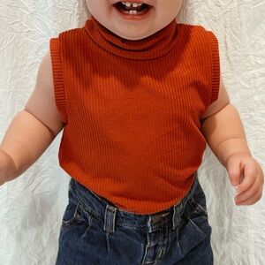 Rust Sleeveless Ribbed Turtleneck Top
